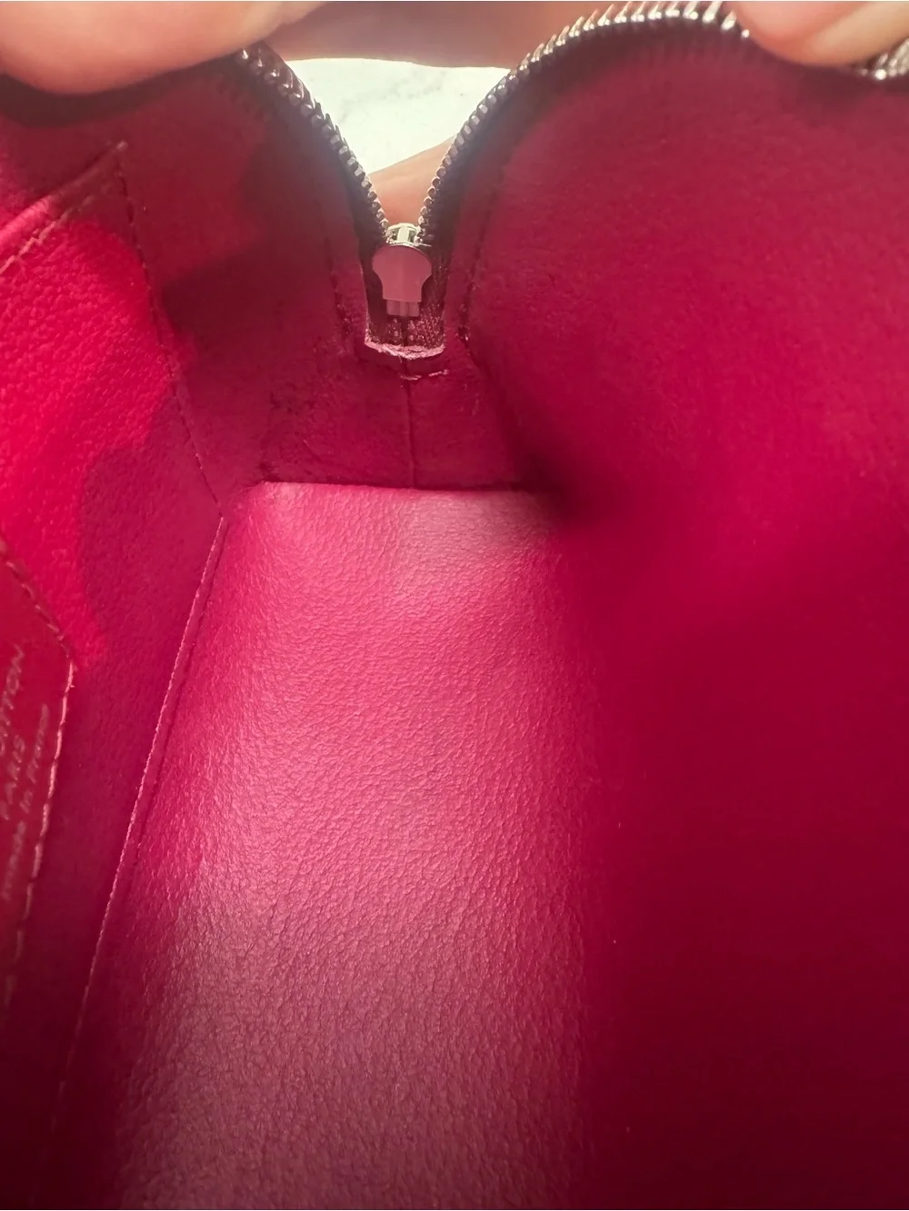 Authentic Louis Vuitton Fuchsia Epi leather cosmetic bag